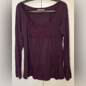 Propaganda long sleeve purple top with pleating on cuffs and neckline. Lg